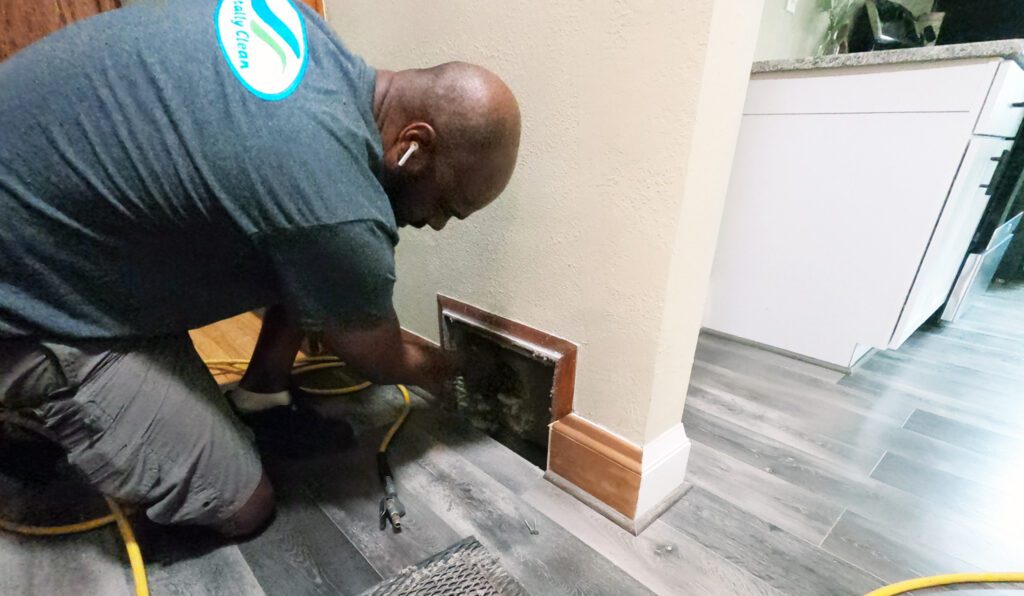 Air duct cleaning owner servicing a home in Milwaukee, WI.